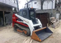 Японский гусеничный мини погрузчик Takeuchi TL-150